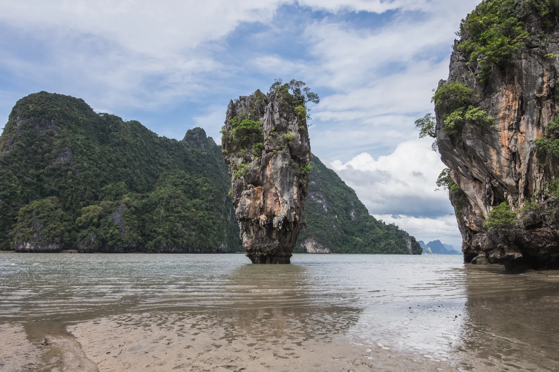 Ko Tapu at James Bond Island, framed by limestone cliffs in Phang Nga Bay