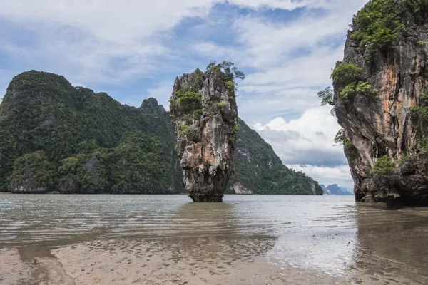 Ko Tapu at James Bond Island, framed by limestone cliffs in Phang Nga Bay